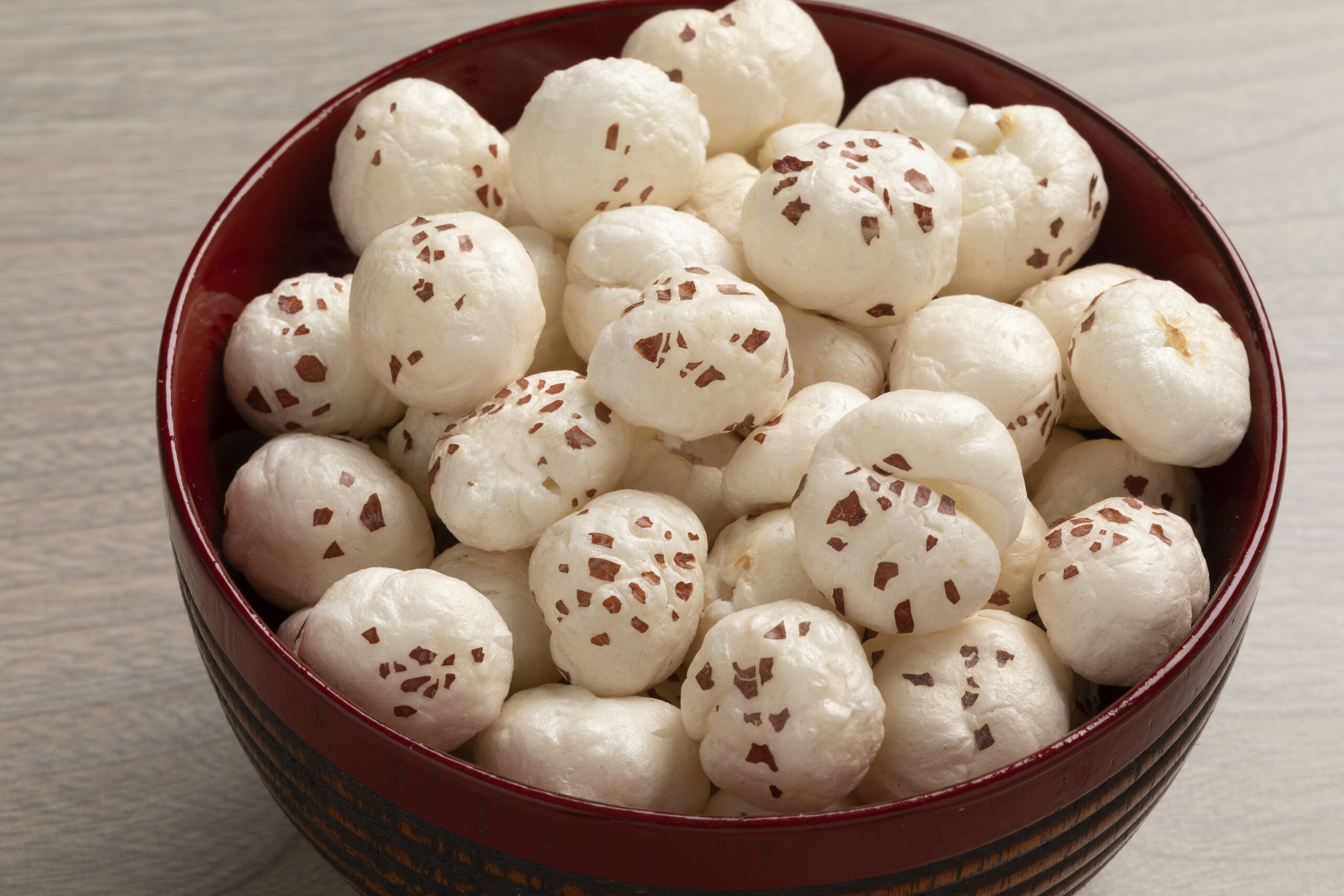 bowl with puffed lotus seed close up